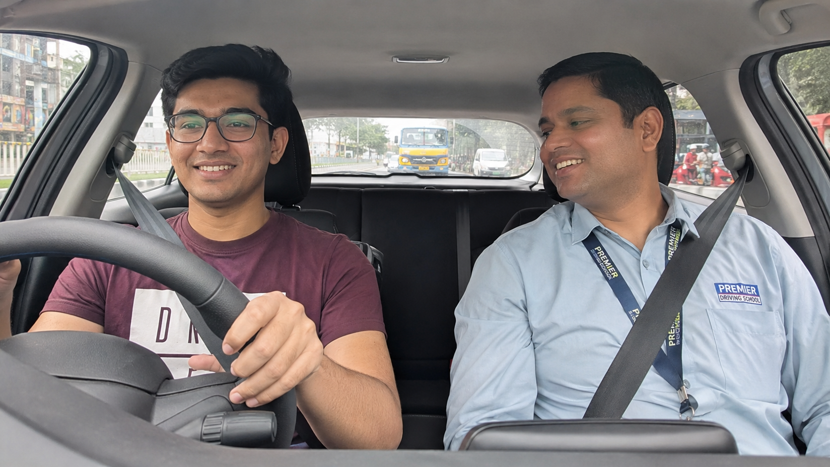 Student learning driving with instructor at Sridhar Motor Driving School Koramangala Bangalore
